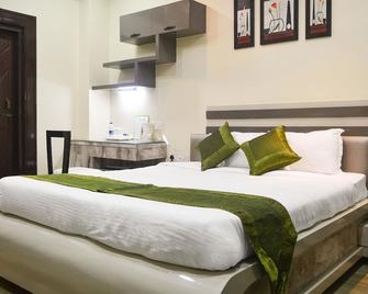 Treebo Trend Aryan Address - Guwahati - Bedroom