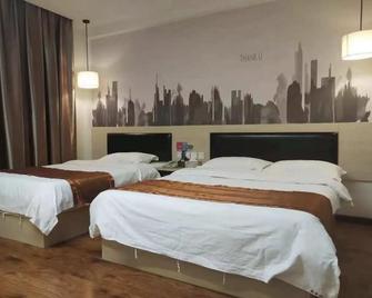 Thank Inn Hotel Hebei Zhangjiakou Zhangbei County Tianbao New City - Zhangjiakou - Bedroom