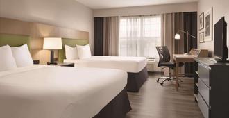 Country Inn & Suites by Radisson, Waterloo, IA - Waterloo - Bedroom