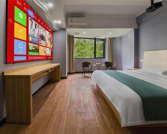 Shell Hotel (Wuzhou Wangcheng Plaza Sun Plaza) - Wuzhou - Slaapkamer