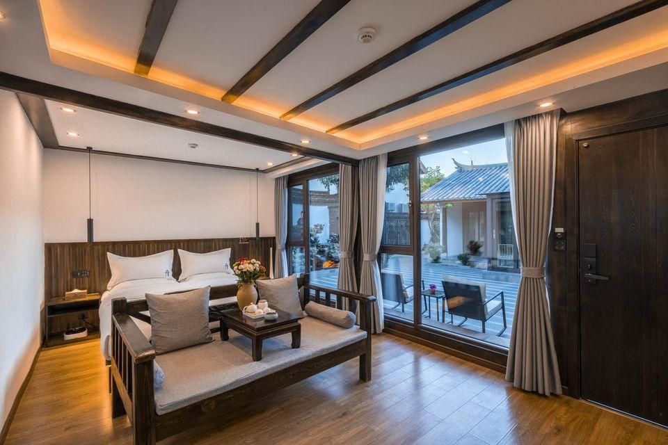 Lijiang Wanju Inn - ליז'יאנג - חדר שינה