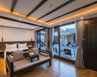 Lijiang Wanju Inn - Lijiang - Schlafzimmer