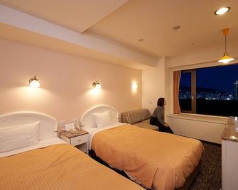Kobe Sannomiya Union Hotel - קובה - חדר שינה
