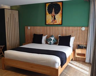 Saphir Boutique Hotel - Кігалі - Спальня