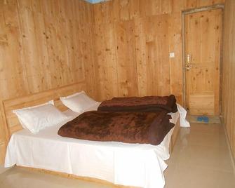 Hotel Hill Paradise - Dehradun - Schlafzimmer
