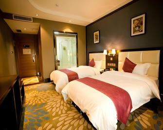 Thank Inn Hotel Jiangsu Xuzhou Xinyi Nanjing Road - Suqian - Bedroom