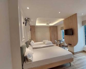 Rajasthani Dhani Hotel - Guwahati - Κρεβατοκάμαρα