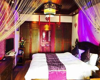 Lansha Xinyuan Boutique Homestay - Lijiang - Bedroom