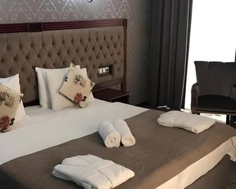 Capitol Hotel - Baku - Schlafzimmer
