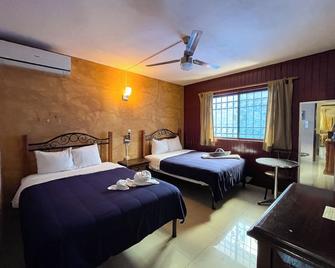 Hotel La Casona Real - קוזומל - חדר שינה