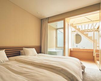 Shonai Hotel Suiden Terrasse - Tsuruoka - Slaapkamer
