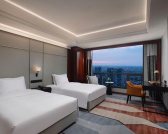 Yangzhou Pearl International Hotel - Yangzhou - Habitación