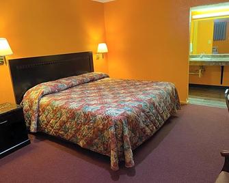Pratt Budget Inn - Pratt - Спальня
