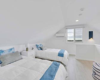 Pristine 1BR w/ loft, Corner Unit + Heated Pool - Amagansett - Chambre