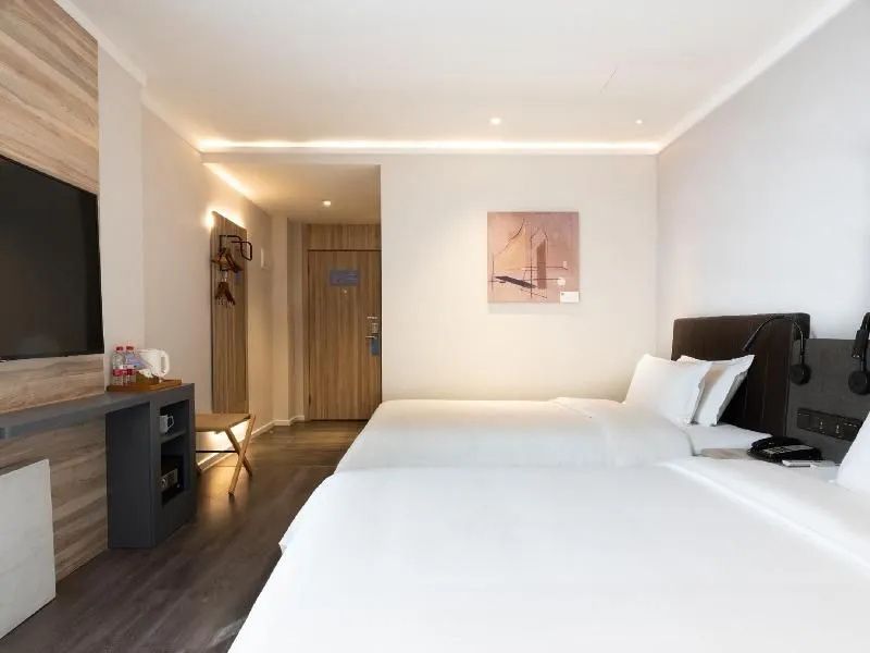 Hanting Hotel Guangzhou Yuexiu Park Memorial Hall - גואנגג'ואו - חדר שינה