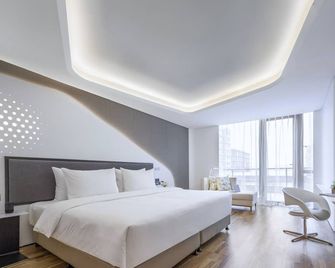 Flyzoo Hotel - Alibaba Future Hotel - Chang-čou - Ložnice