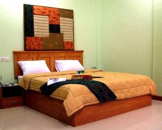Grand Sirao Hotel - Medan - Bedroom