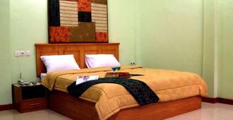 Grand Sirao Hotel - Medan - Chambre