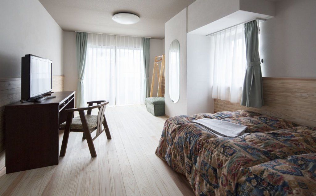 هوتل آند ريزيدنس نانشوكان