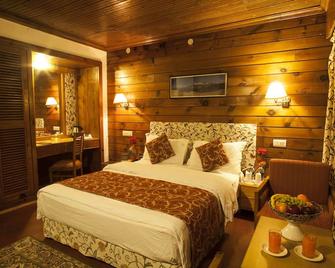 Hotel Heevan Pahalgam - Pahalgam - Schlafzimmer