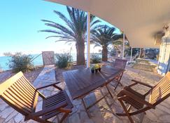 a front beach cottage in a protected area - Messolonghi - Patio