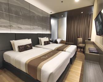 Aveon Hotel Yogyakarta by Daphna Management - Yogyakarta - Bedroom
