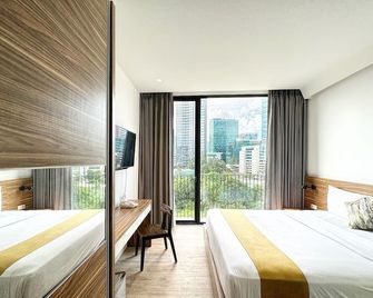 Rasuna Icon Hotel - ג'קרטה - חדר שינה