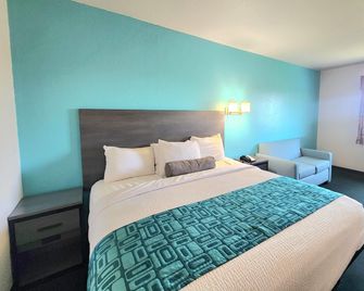 Howard Johnson by Wyndham Galveston - Galveston - Schlafzimmer