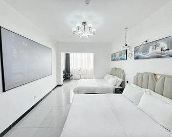 Huaxin Apartment Hotel - Changsha - Bedroom
