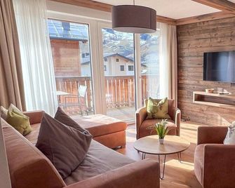 Apart Hotel Golden Lodges Rauris - Rauris - Huiskamer