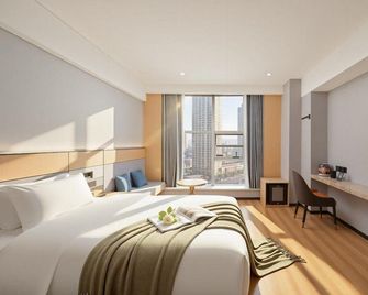 Lihe Hotel (Xiyingmen International Building Merchants Garden City) - Jiujiang - Bedroom
