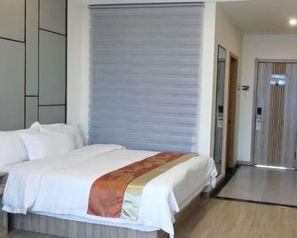 Jiusan Jingu Hotel - Heihe - Habitación
