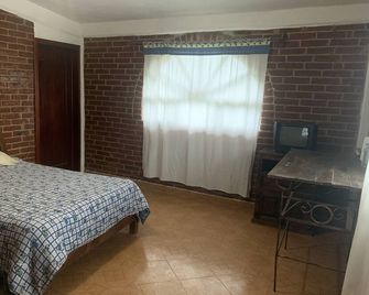 cabin with beautiful view of the Malinche wing, fireplace, hydromassage - Tocatlan - Sypialnia