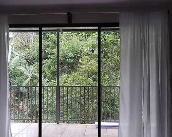 Río Celeste Katira, Private room overlooking Green Areas - Katira - Balcón