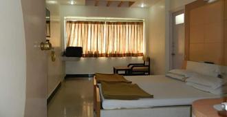 Hotel Vaishali - 納希克 - 臥室
