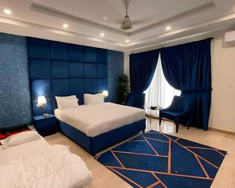 Alpine lodges - Islamabad - Schlafzimmer