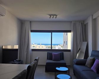 Two-Bedroom Suites by Kentrikon 1924 Boutique Hotel, Old Town - Paphos - Living room