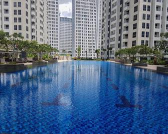 Restful and Homey Studio Apartment M-Town Residence By Travelio - Tangerang City
