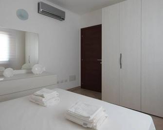 Welcomely - Xenia Boutique House - Olbia - Bedroom