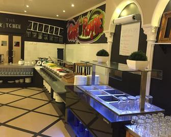 رويال جراند هوتل - مونروفيا - مطعم