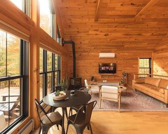 This house is a 3 bedroom(s), 3 bathrooms, located in Sunderland, VT. - Sandgate - Dining room