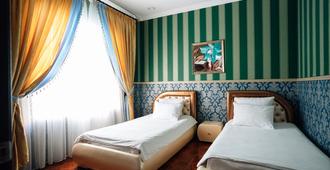 Malibu Hotel - Omsk - Schlafzimmer