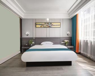 Venice Fashion Hotel - Laibin - Habitación