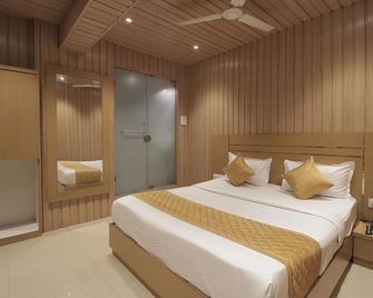 Hotel Malad Inn - Mumbai - Schlafzimmer