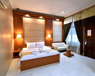Hotel Sendang Sari Batang - Pekalongan - Slaapkamer