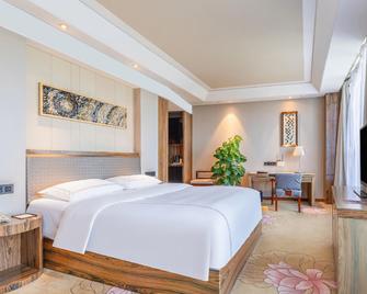 Inzone Garland Hotel Jiaxiang - Jining - Bedroom