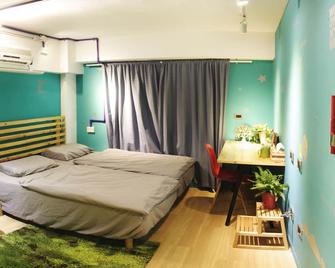 Leo Ho Hostel - טאינאן - חדר שינה