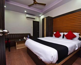 Capital O 42660 Hotel Greenland Towers - Kharagpur - Bedroom