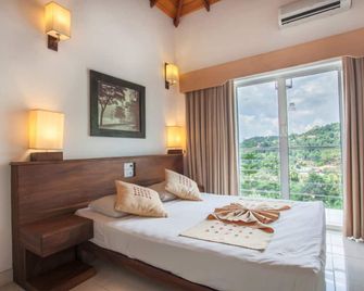 Senani Hotel - Kandy - Phòng ngủ
