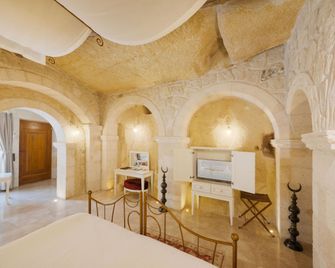 Tafoni Houses Cave Hotel - Urgup - Slaapkamer